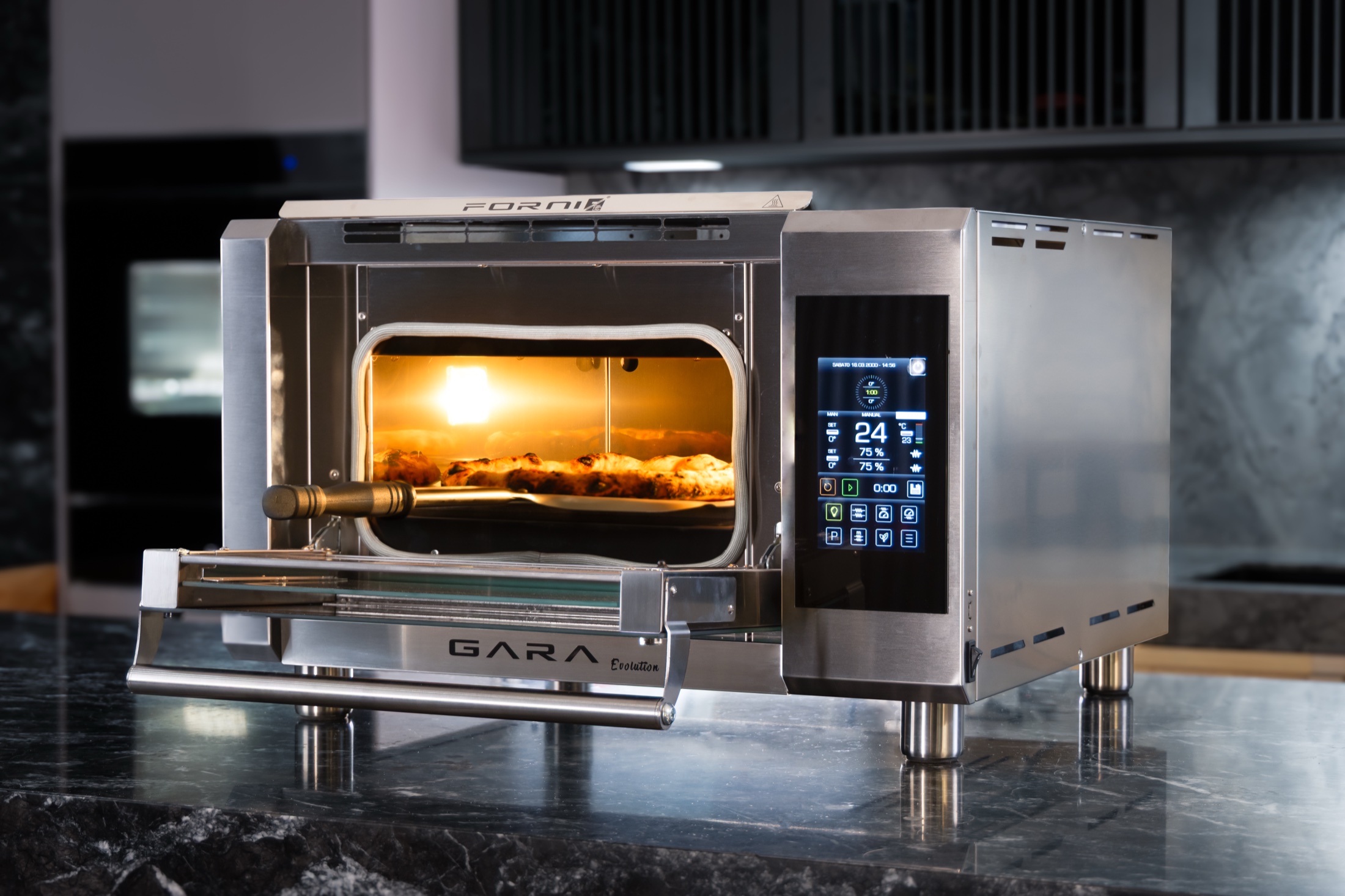 Forno Gara Evolution in acciaio con sportello aperto e pizze in cottura